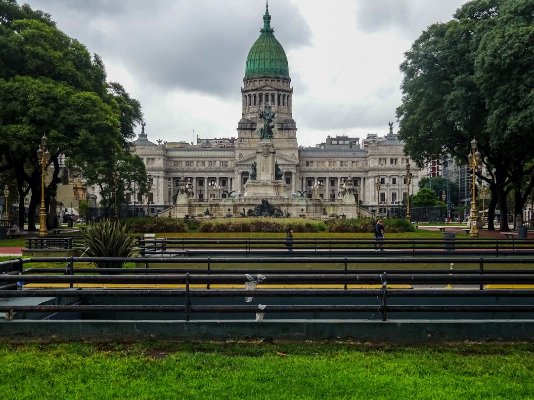 Grand building with a dome and trees